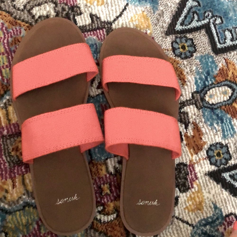 Sanuk sandals in orange tangerine